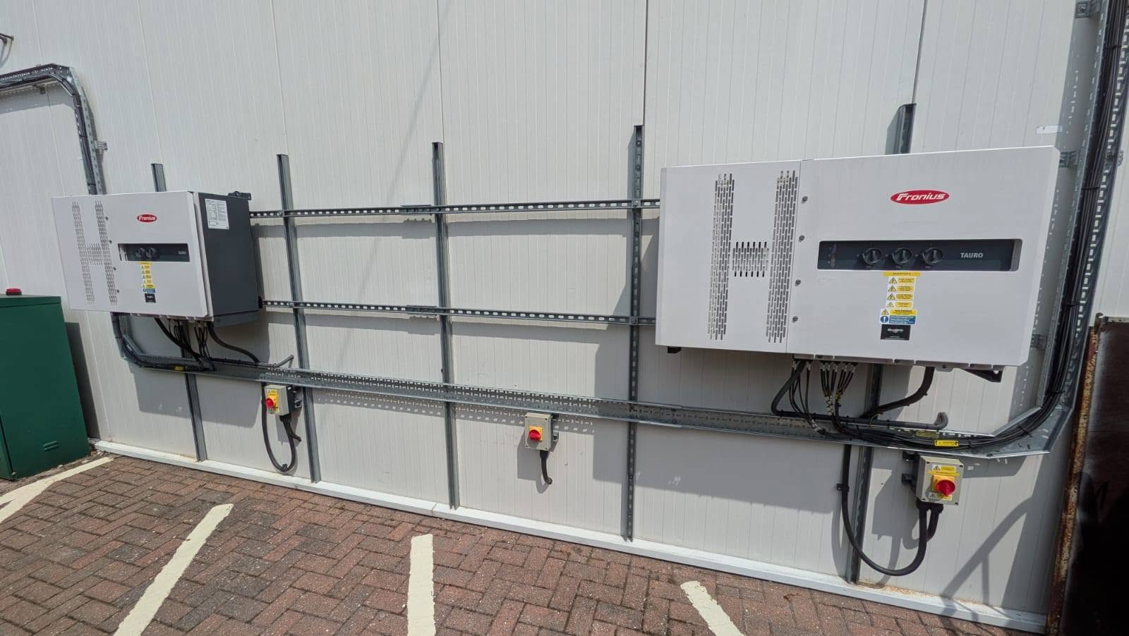 Fronius inverters connected at a commercial solar installation.